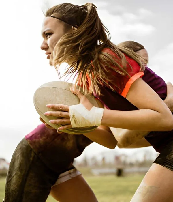 female wearing rugby uniform designed by Humex Apparel