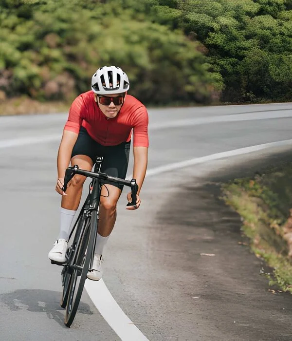 man riding cyle wearing cycling uniform designed by Humex Apparel